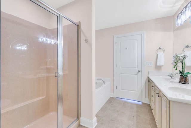 bathroom with plus walk in shower, tile patterned floors, and vanity