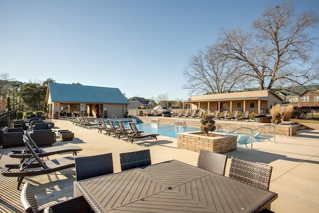 view of pool featuring a patio