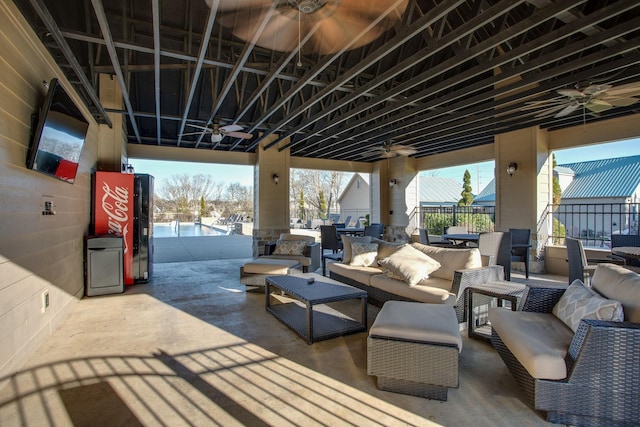 view of patio with ceiling fan and outdoor lounge area