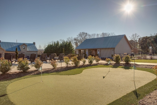 view of home's community with a patio area