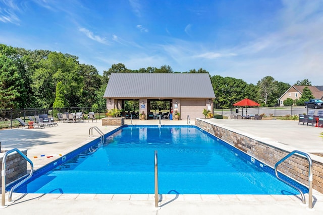 view of pool with a patio area