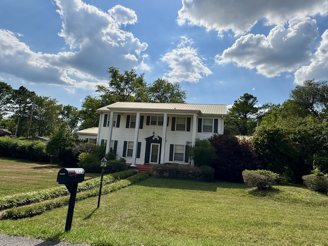 view of front of home with a front yard