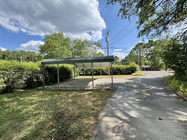 view of parking with a carport