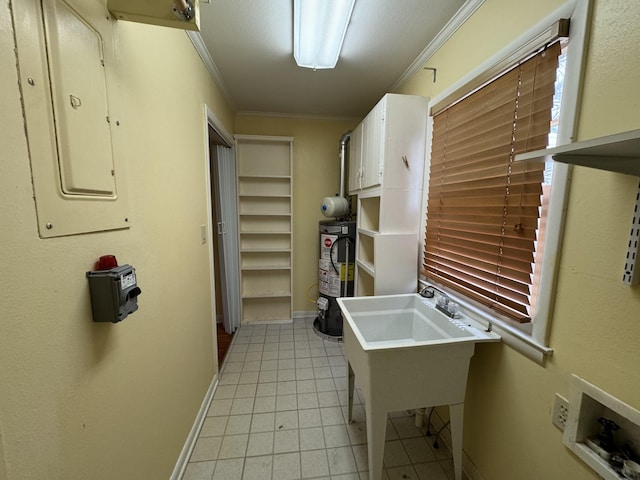 kitchen featuring kitchen peninsula, ornamental molding, water heater, electric panel, and a breakfast bar area