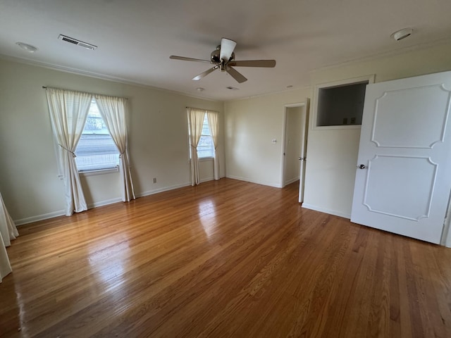 unfurnished bedroom featuring hardwood / wood-style flooring and ceiling fan