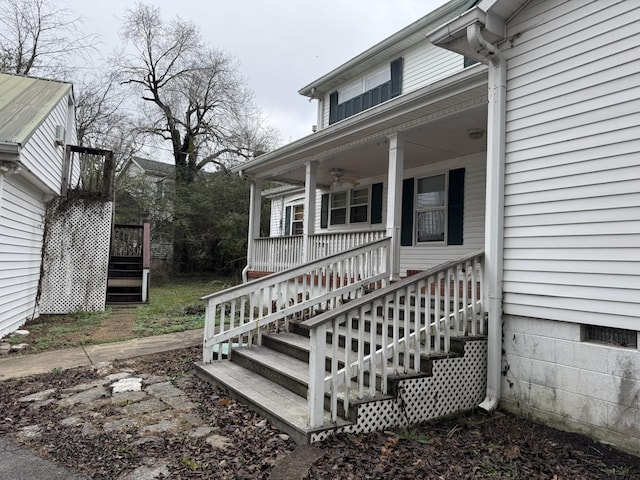 doorway to property with a porch