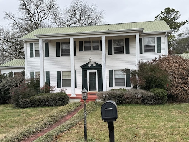 view of front of house with a front lawn