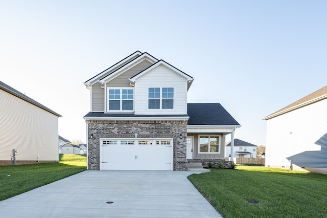 view of front of house with a garage and a front yard