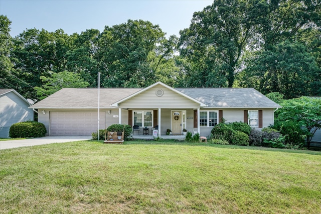 ranch-style home featuring a porch, a garage, and a front yard