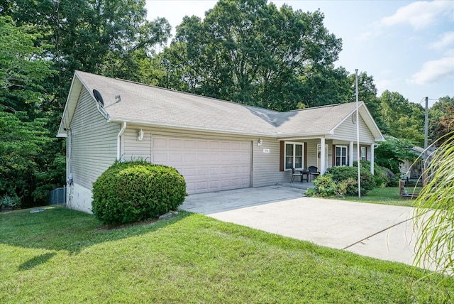 ranch-style house featuring a porch, a garage, central AC unit, and a front lawn