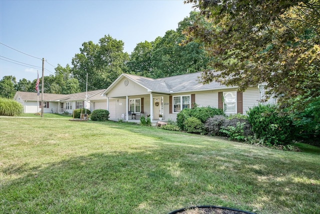 ranch-style home with covered porch and a front lawn