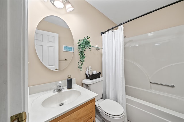 full bathroom with shower / bath combo with shower curtain, toilet, and vanity