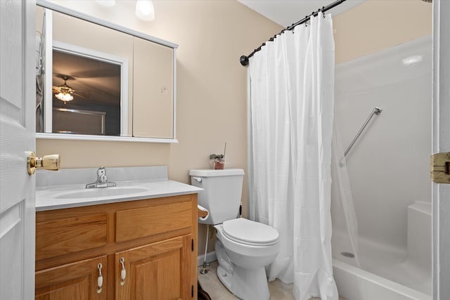 bathroom featuring vanity, tile patterned flooring, ceiling fan, and toilet