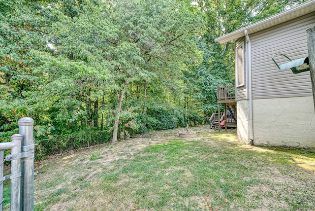 view of yard featuring a deck