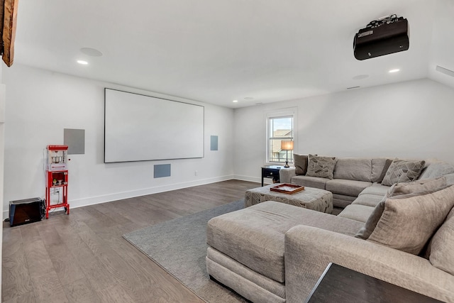 cinema room featuring hardwood / wood-style floors