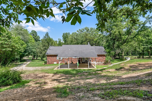 rear view of house featuring a patio area