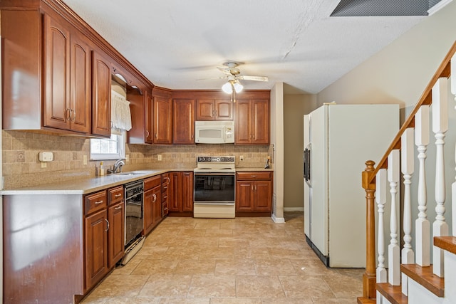 kitchen with decorative backsplash, white appliances, light tile patterned floors, and ceiling fan