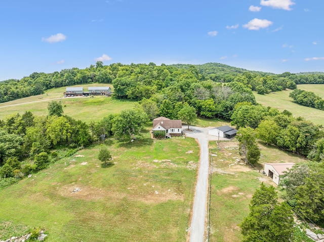 birds eye view of property featuring a rural view