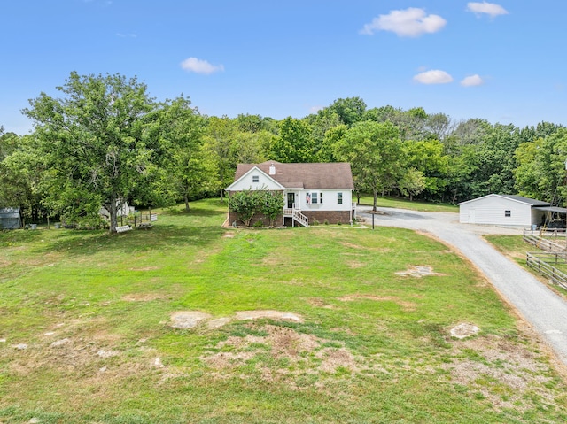 view of front of property with a front lawn