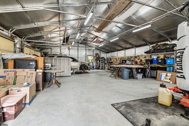 garage with a workshop area