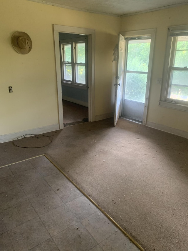 interior space featuring baseboards