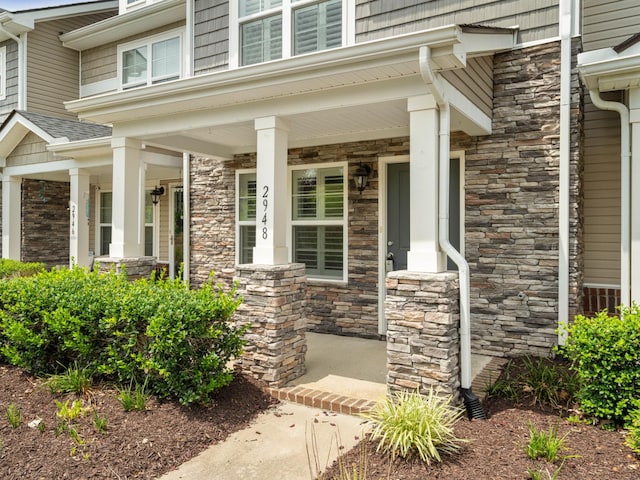 entrance to property with covered porch