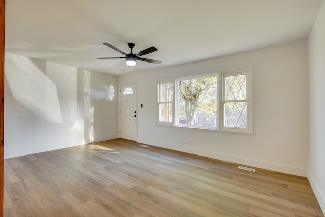 interior space featuring light hardwood / wood-style flooring and ceiling fan