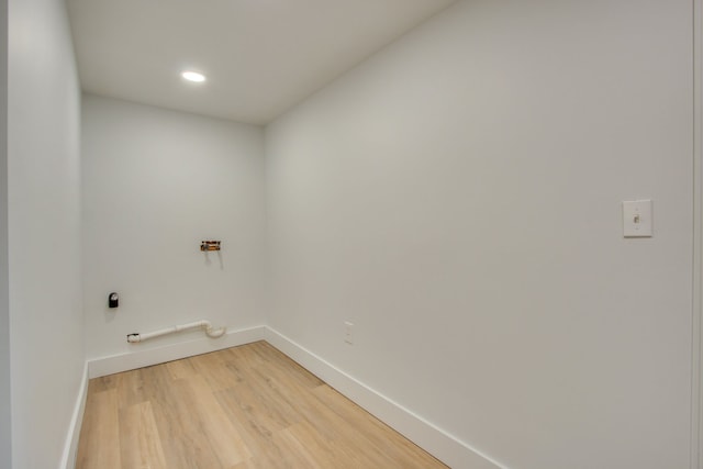 laundry room featuring hardwood / wood-style floors