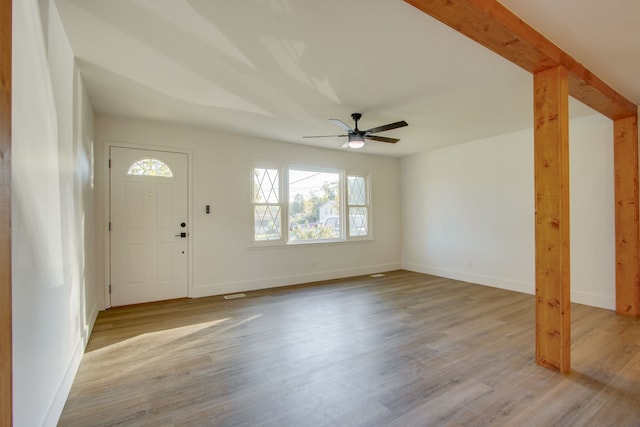 entrance foyer with ceiling fan and light hardwood / wood-style flooring