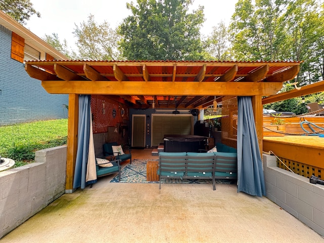 view of patio / terrace featuring an outdoor living space, a pergola, and a hot tub