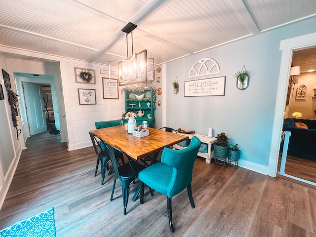 dining room with dark hardwood / wood-style flooring