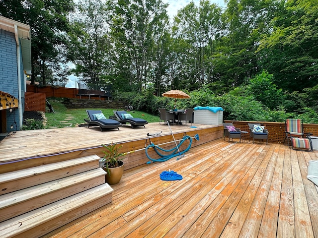 wooden deck featuring an outdoor hangout area