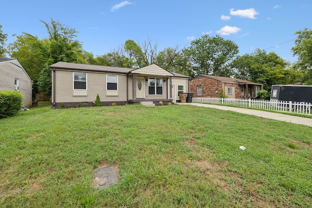 ranch-style house with a front lawn