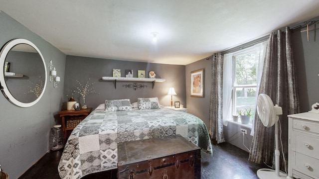 bedroom featuring dark wood-type flooring