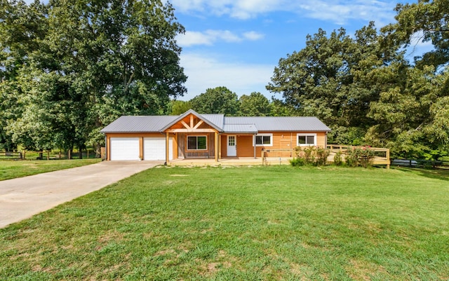 single story home with a garage, a porch, and a front yard