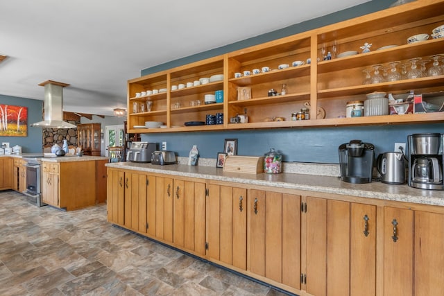 kitchen with stainless steel electric range oven and island range hood