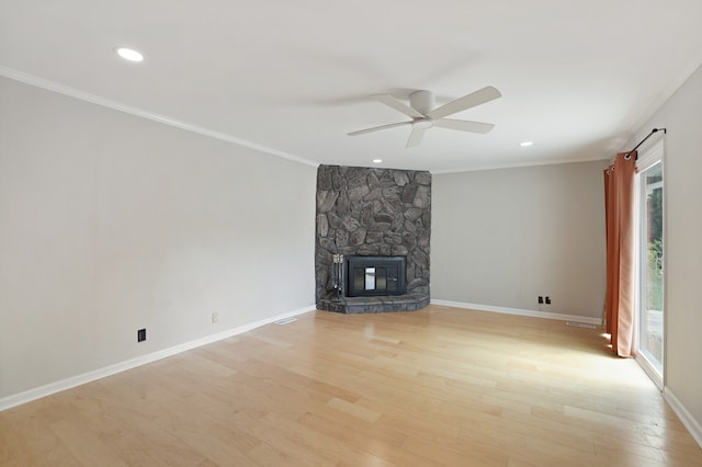 unfurnished living room featuring light hardwood / wood-style flooring, ceiling fan, and plenty of natural light