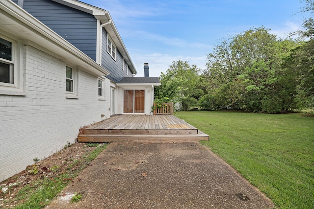 view of yard featuring a wooden deck