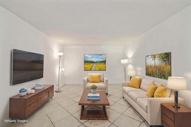 tiled living room with a textured ceiling