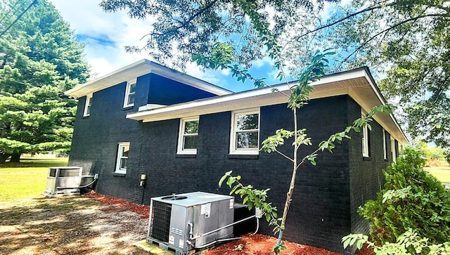 view of home's exterior featuring central AC unit