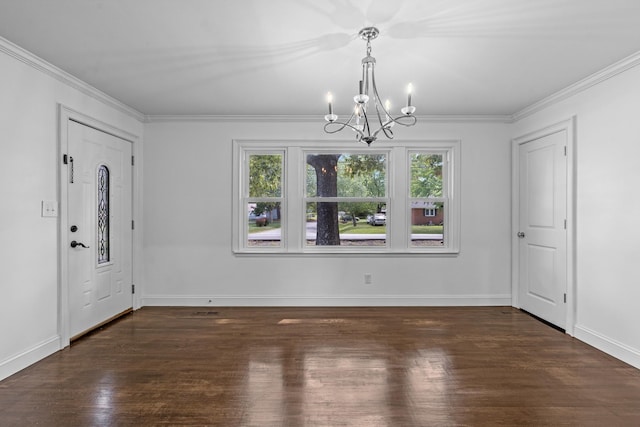 unfurnished dining area featuring a notable chandelier, dark wood-type flooring, baseboards, and crown molding