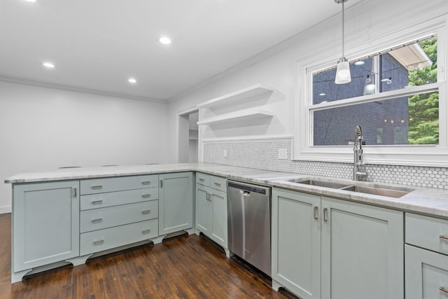 kitchen featuring dishwasher, decorative light fixtures, a peninsula, open shelves, and a sink