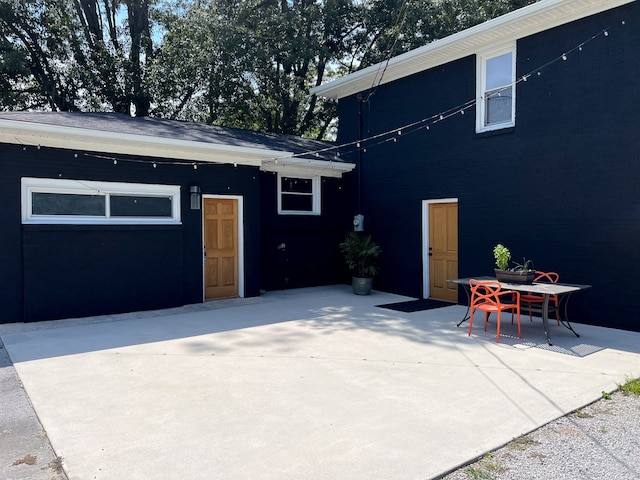 back of property featuring a patio