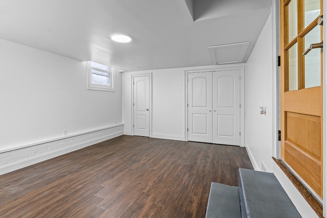 interior space with dark wood-type flooring