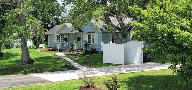 view of front of property with a front lawn