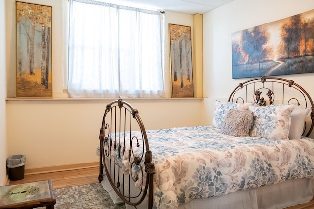 bedroom featuring hardwood / wood-style floors