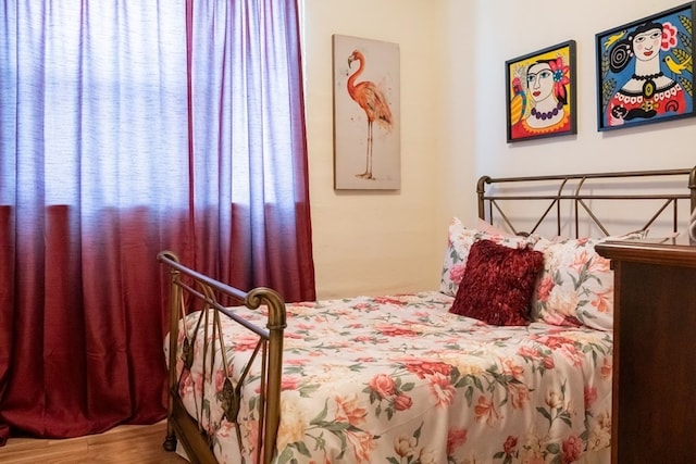 bedroom featuring hardwood / wood-style flooring