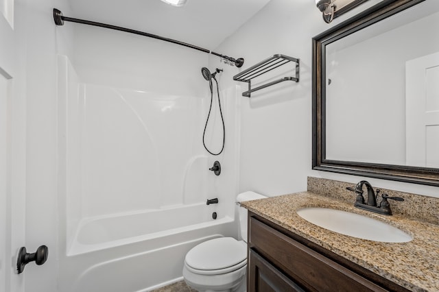 full bathroom with shower / tub combination, vanity, and toilet