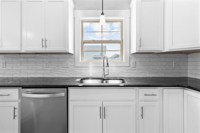 kitchen with sink, dishwasher, hanging light fixtures, white cabinets, and decorative backsplash