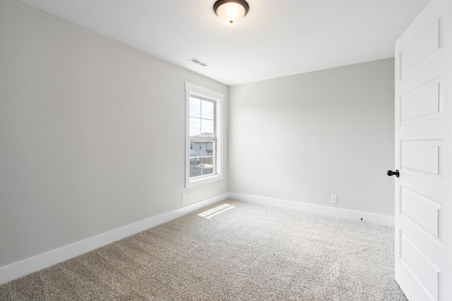 unfurnished room with carpet